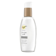 OGX serum applied to damp hair mid-lengths illustrating detangling and reduced breakage