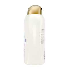 OGX conditioner placed in shower illustrating everyday use and convenience