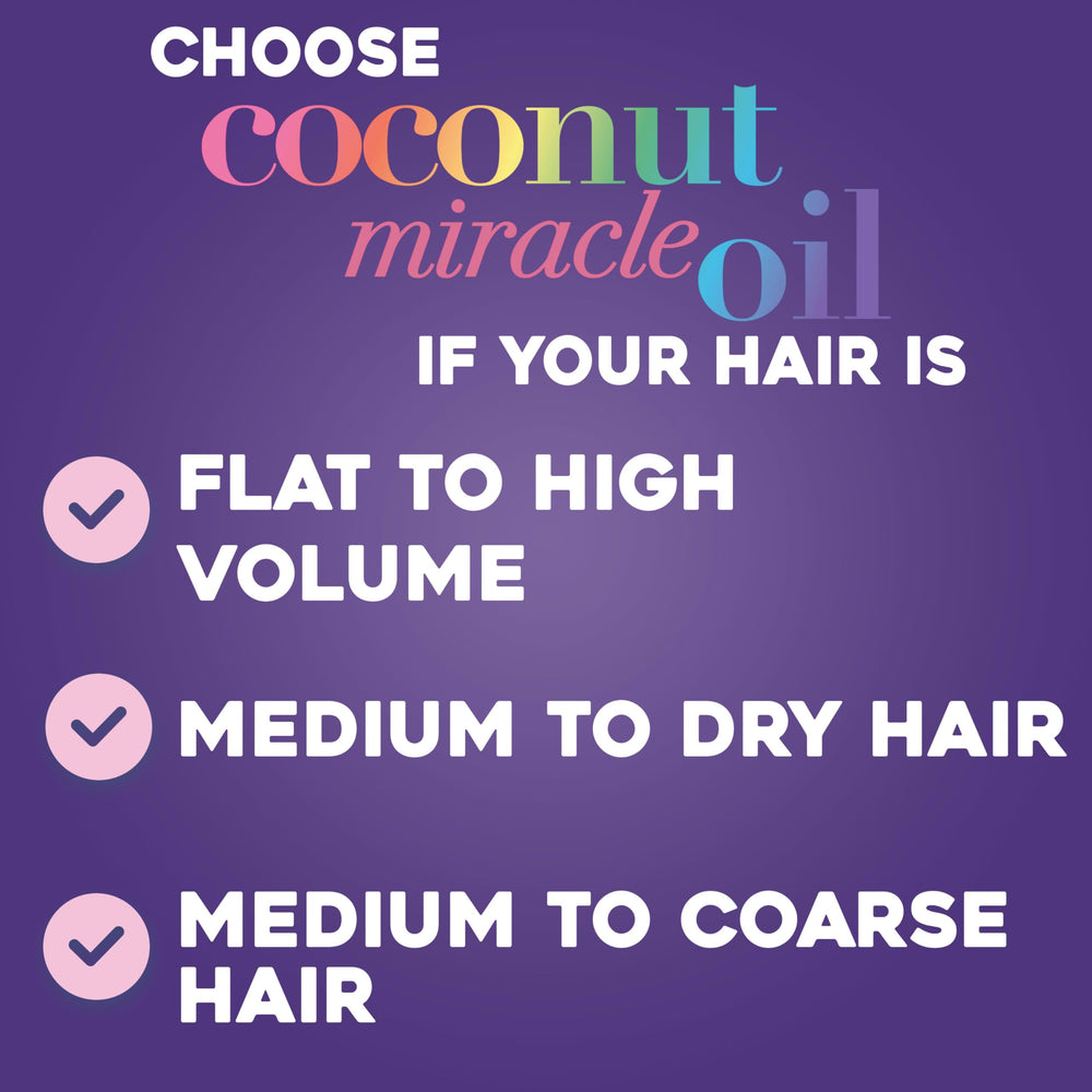 OGX creamy conditioner texture on hand providing visible slip for detangling