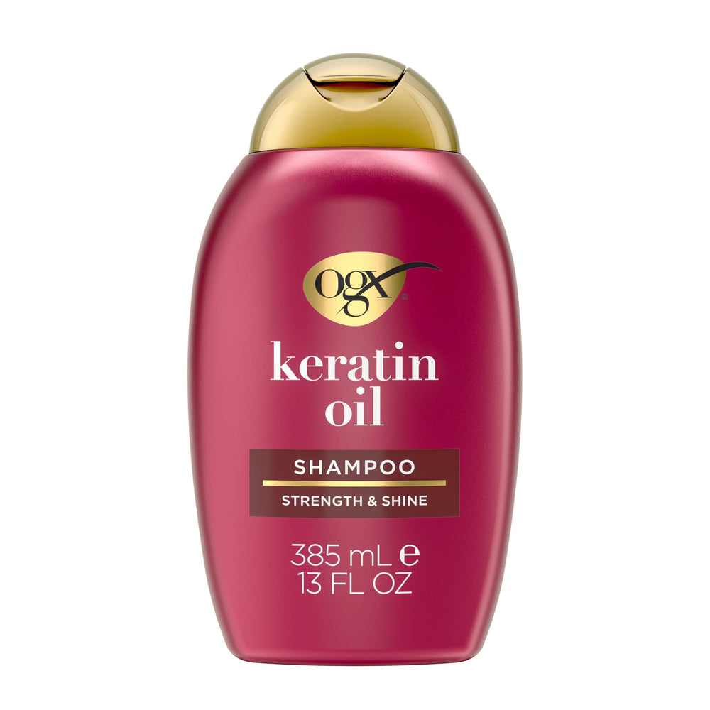 OGX front packaging of keratin oil shampoo showing bottle and benefits