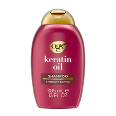 OGX front packaging of keratin oil shampoo showing bottle and benefits