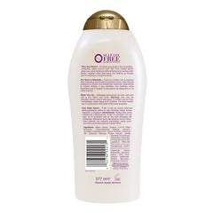 OGX bottle on bathroom shelf in lifestyle scene suggesting daily routine