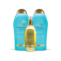 OGX lotion surrounded by flowers and citrus, scent profile and fresh aroma benefit