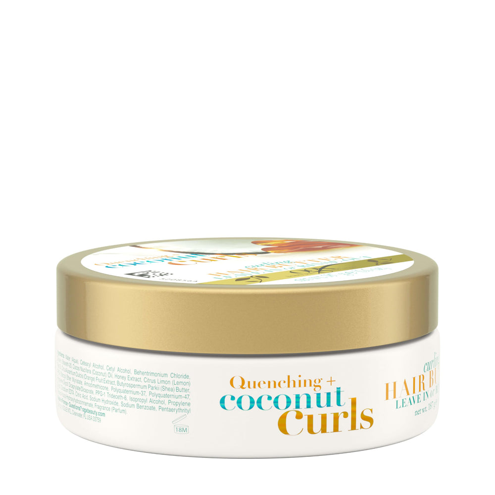 OGX packaging label close-up listing coconut oil and honey benefits