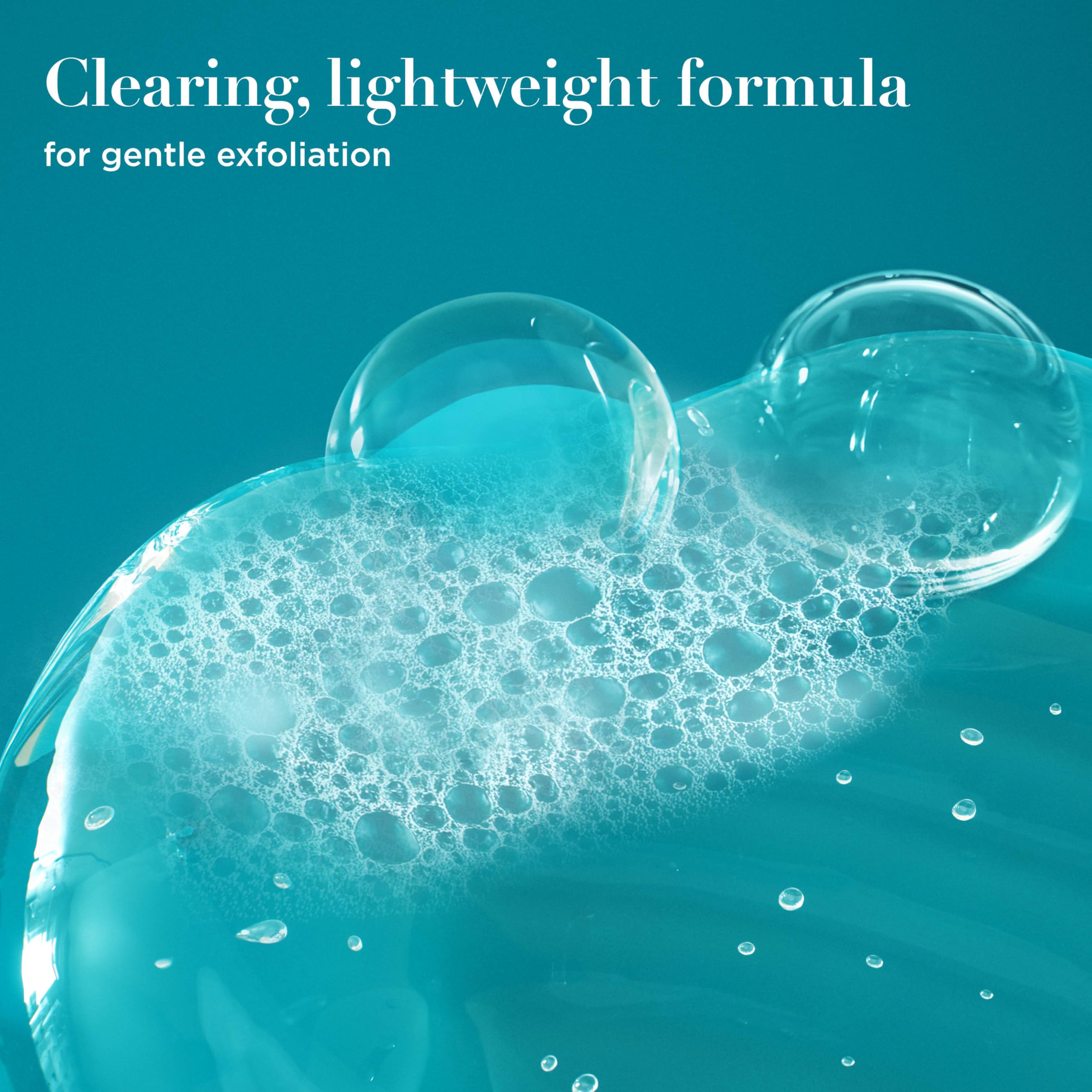 Close-up of OGX ProGrowth creamy texture showing exfoliating consistency