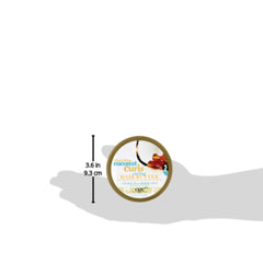 OGX product beside hand for scale emphasizing travel-friendly 6.6 oz