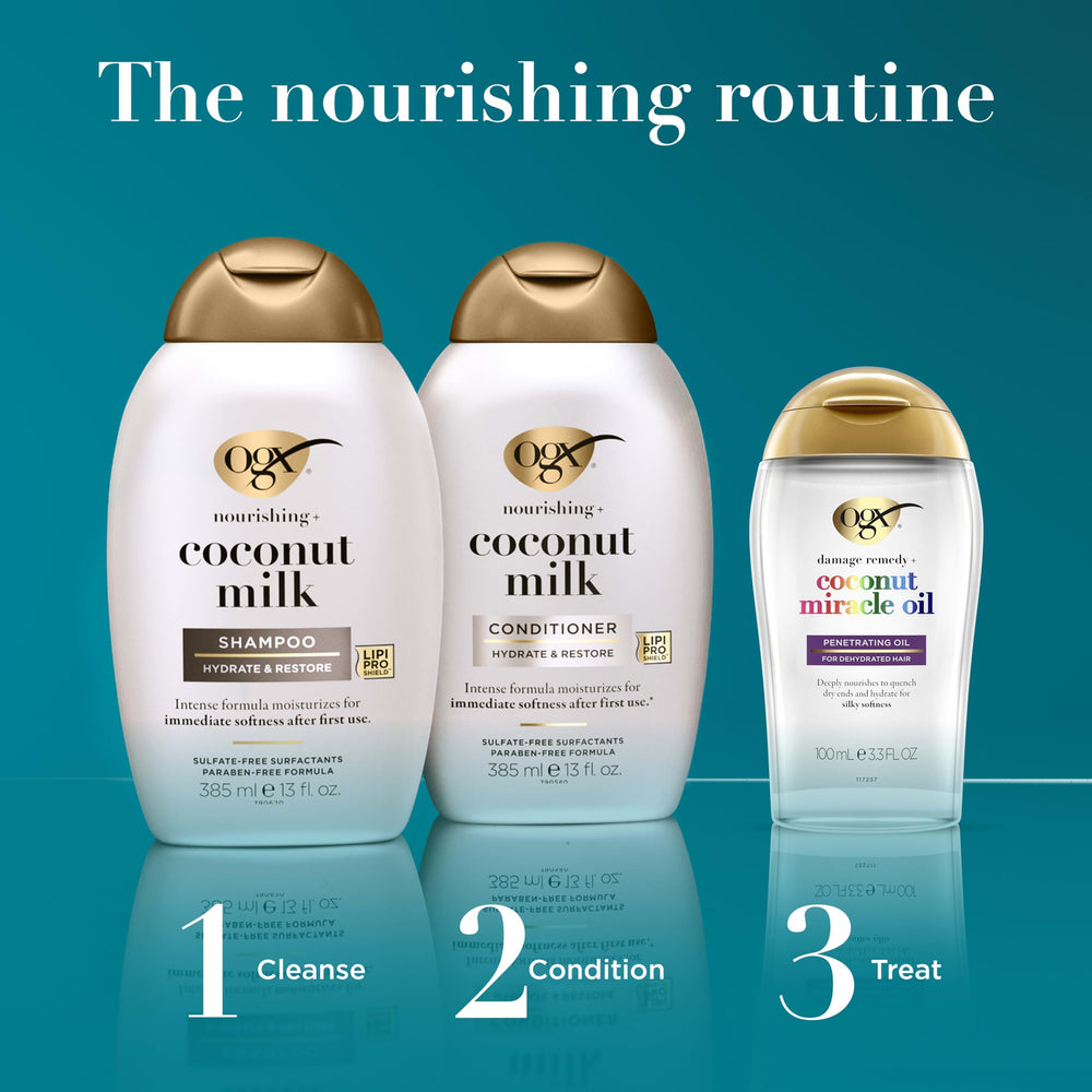 OGX 3.3 fl oz bottle held in hand conveying compact travel-ready size