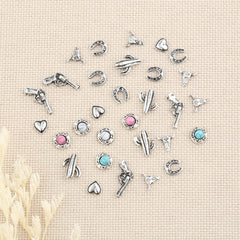 Ohmique charm applied to manicure showing easy application and durable hold