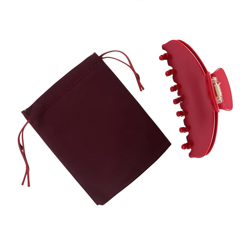 OideGuiing clip holding a bun in hair to show secure all-day hold benefit