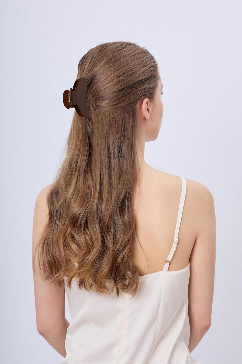 OideGuiing coffee clip holding high ponytail to keep hair comfortably secure
