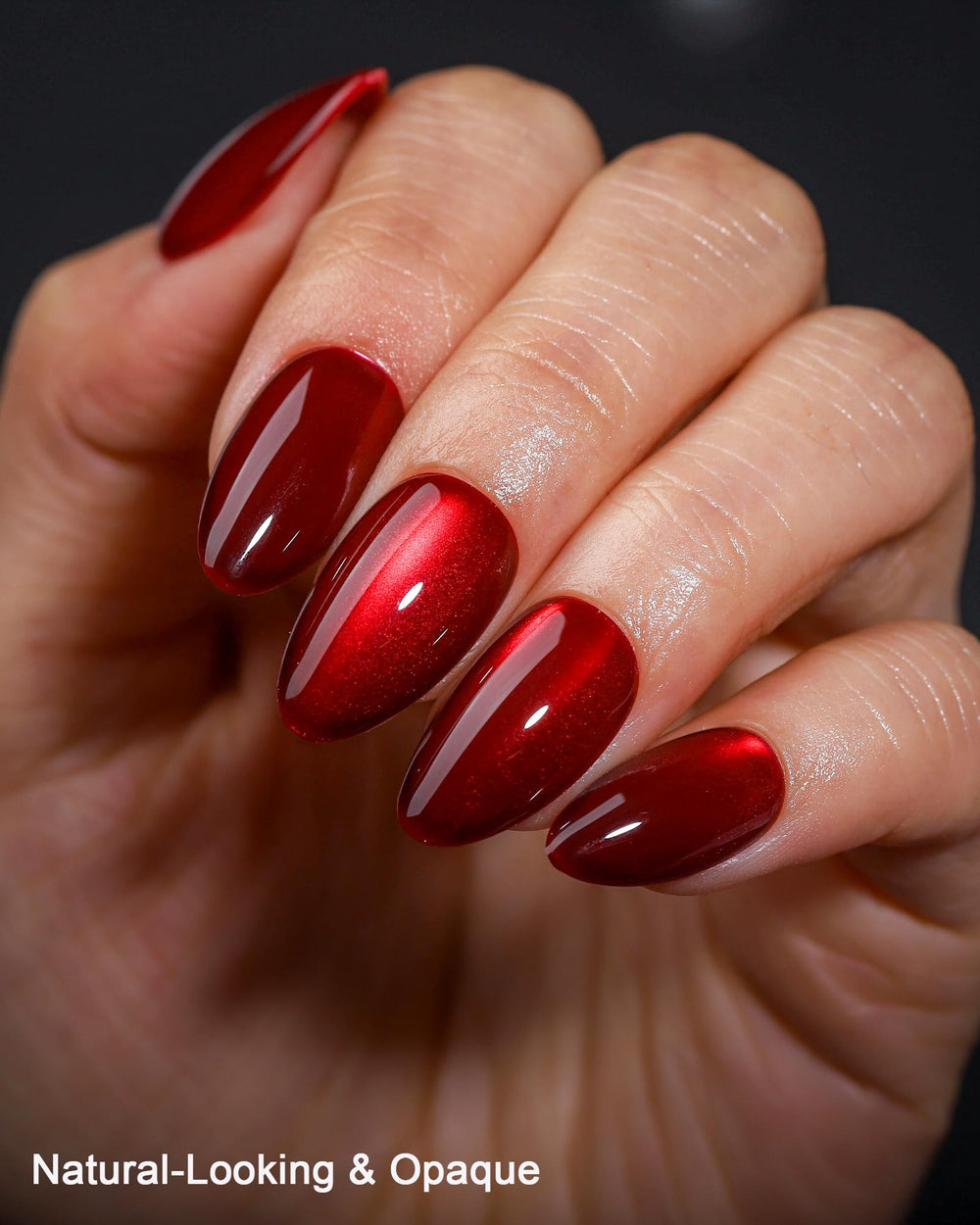 OIFEN press-on nails in hand to show scale and realistic fit for everyday use