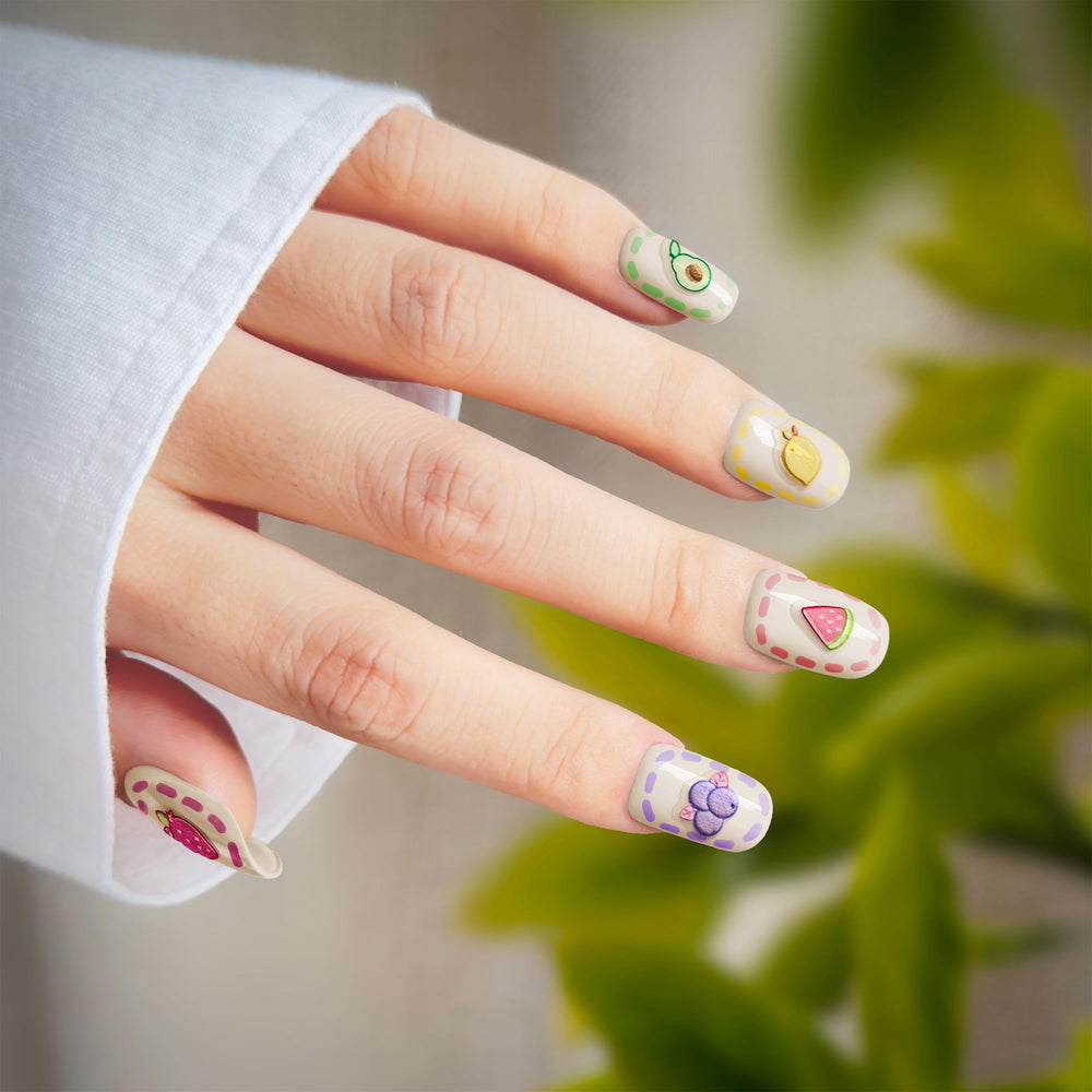 okiyomi nail in use on a child demonstrating easy application and playful results