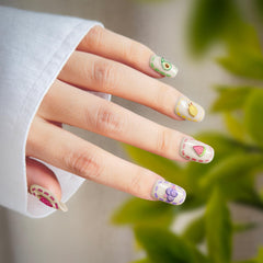 okiyomi nail in use on a child demonstrating easy application and playful results