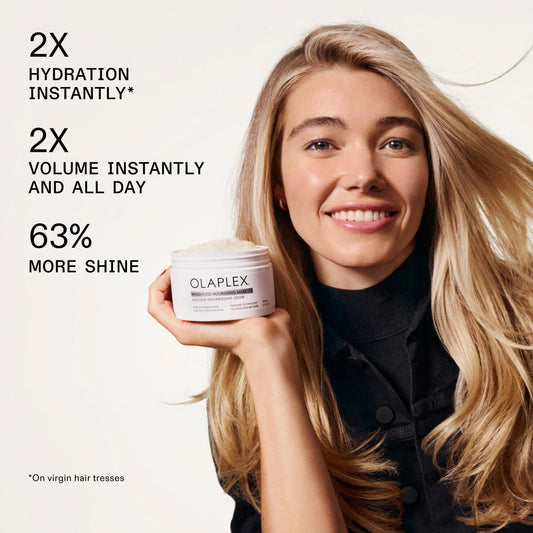Close-up of Olaplex mask texture demonstrating creamy slip for easy detangling