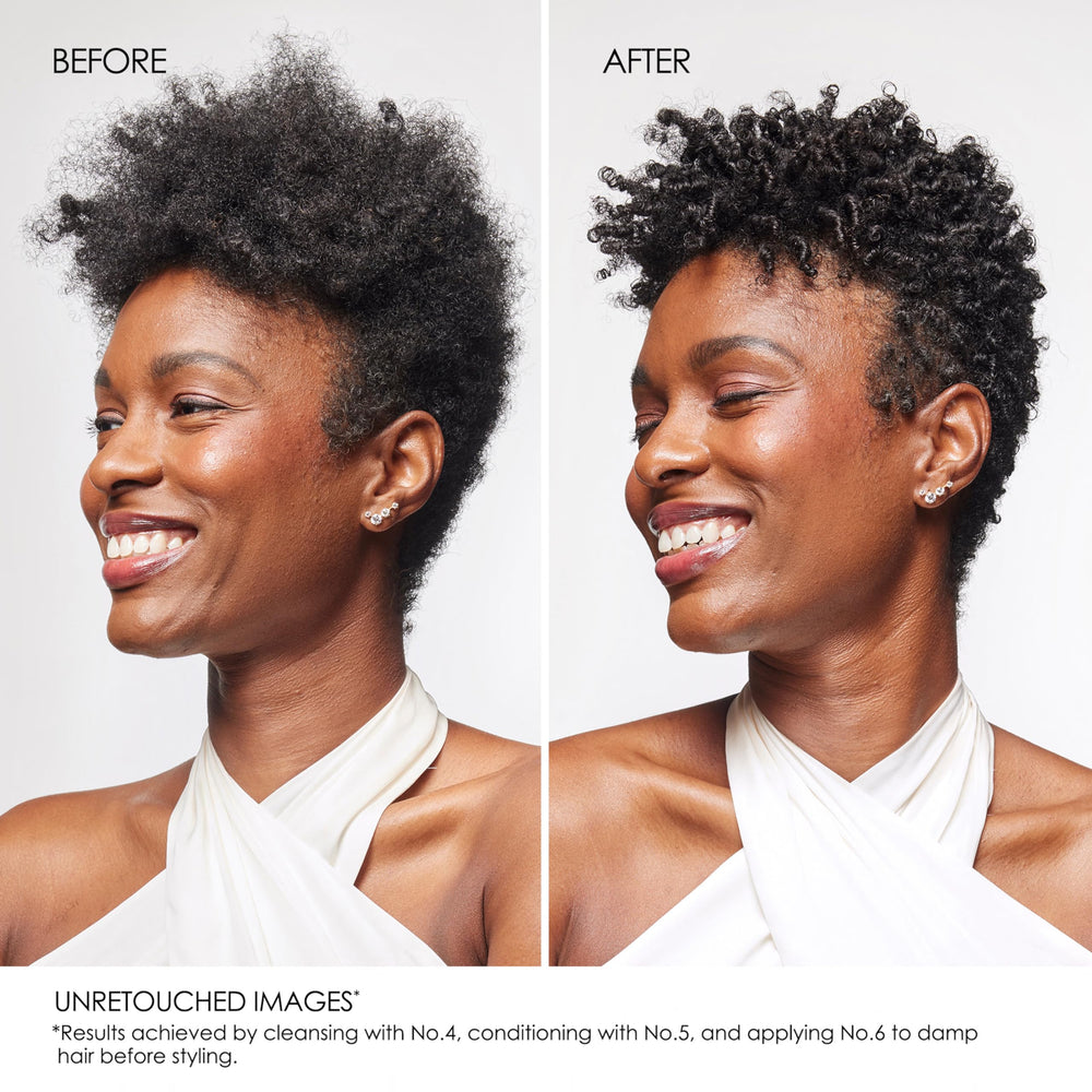 Olaplex Nº.5 being applied to wet hair in shower for smoother detangling