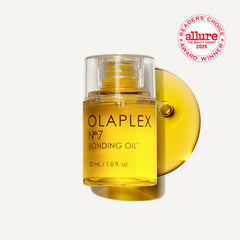 Olaplex No.7 dispensing a drop illustrating concentrated formula and economical use