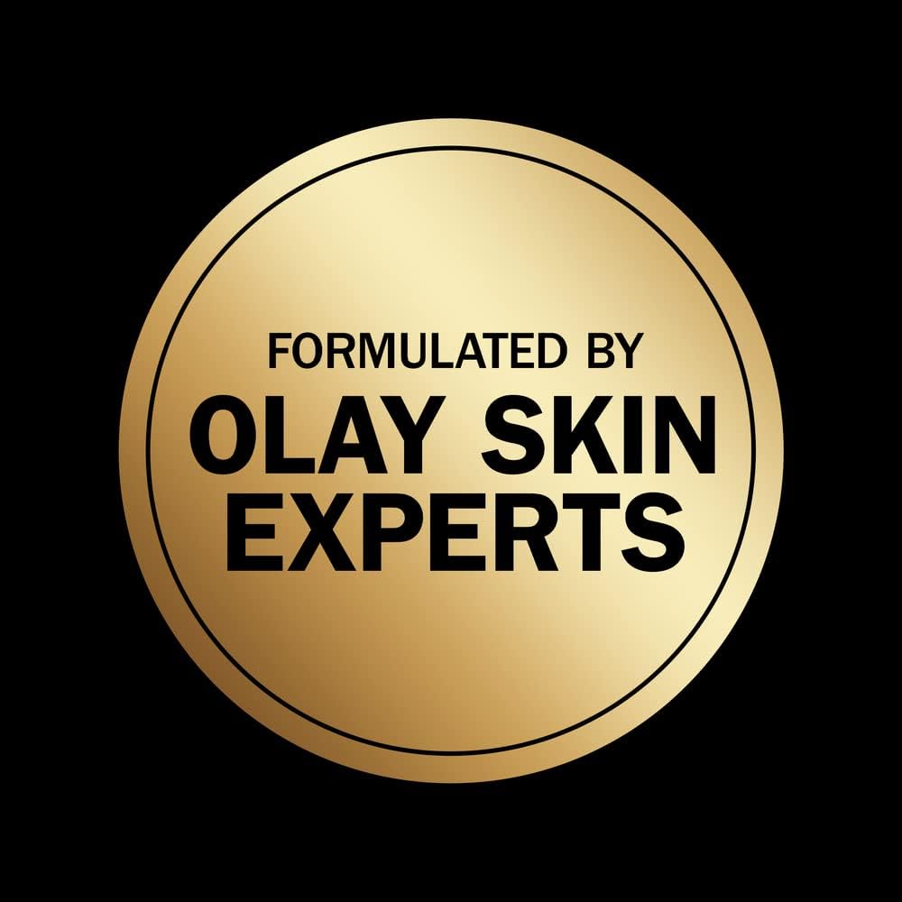 Hand holding Olay bar under water showing easy use and refreshing feel