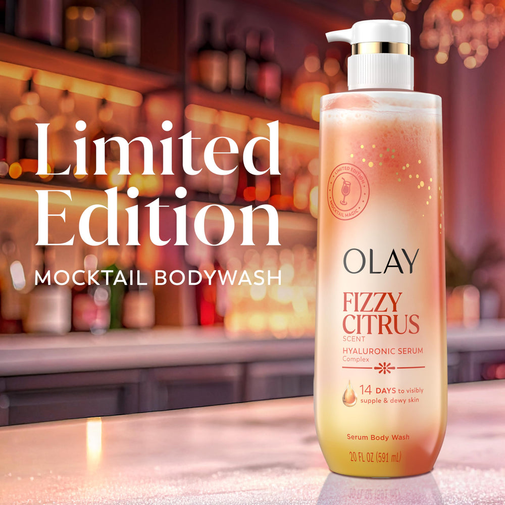 Flat-lay of key ingredients with Olay bottle highlighting serum complex