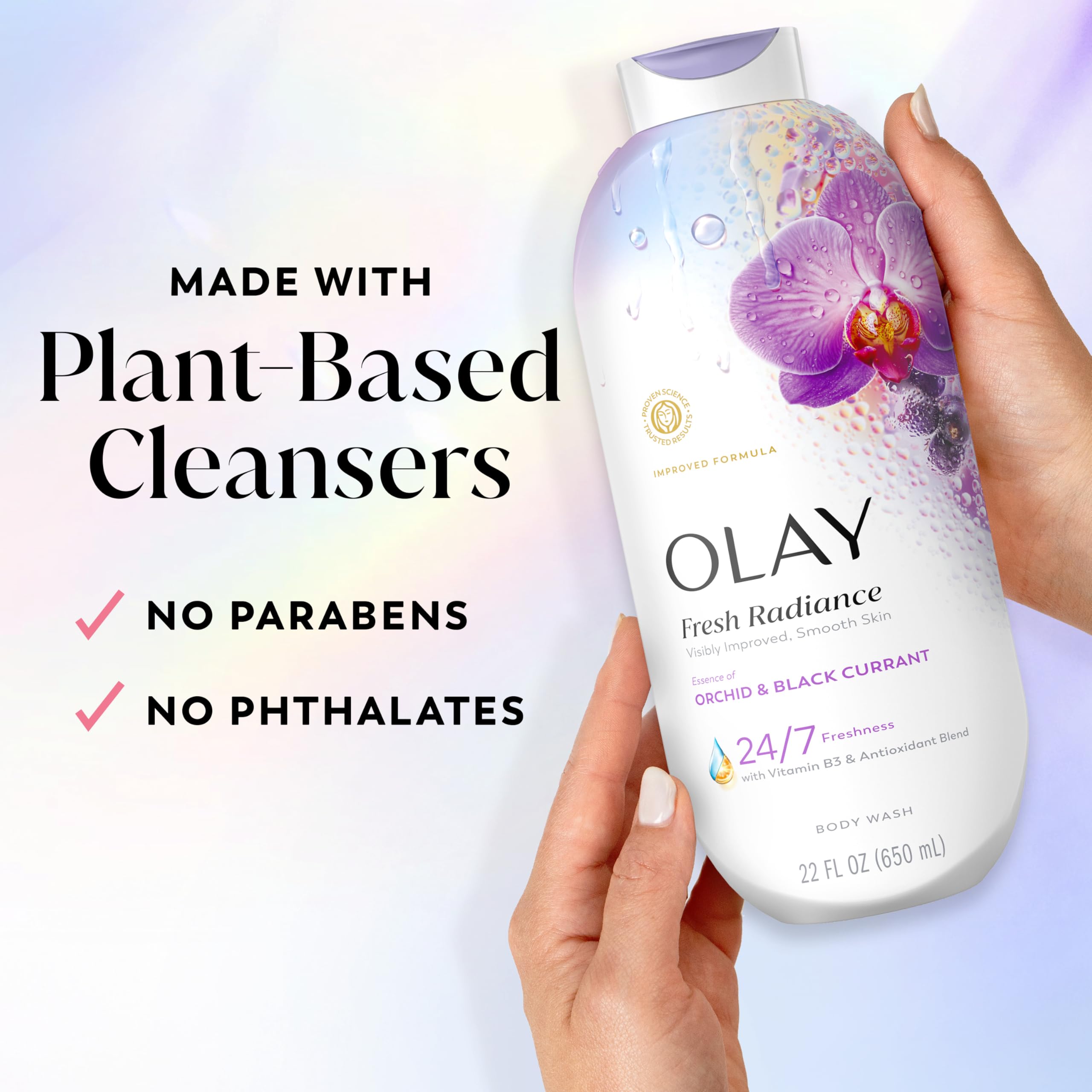 Olay 22 fl oz bottle shown next to hand for size comparison benefit