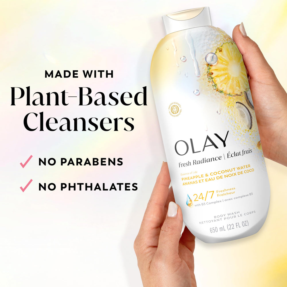 Pineapple and coconut water visual suggesting Olay fresh fruity scent