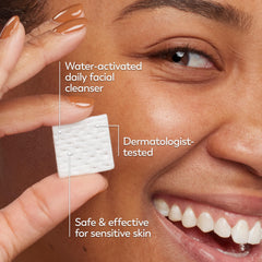 Olay applying activated cleanse to hands illustrating easy water activation