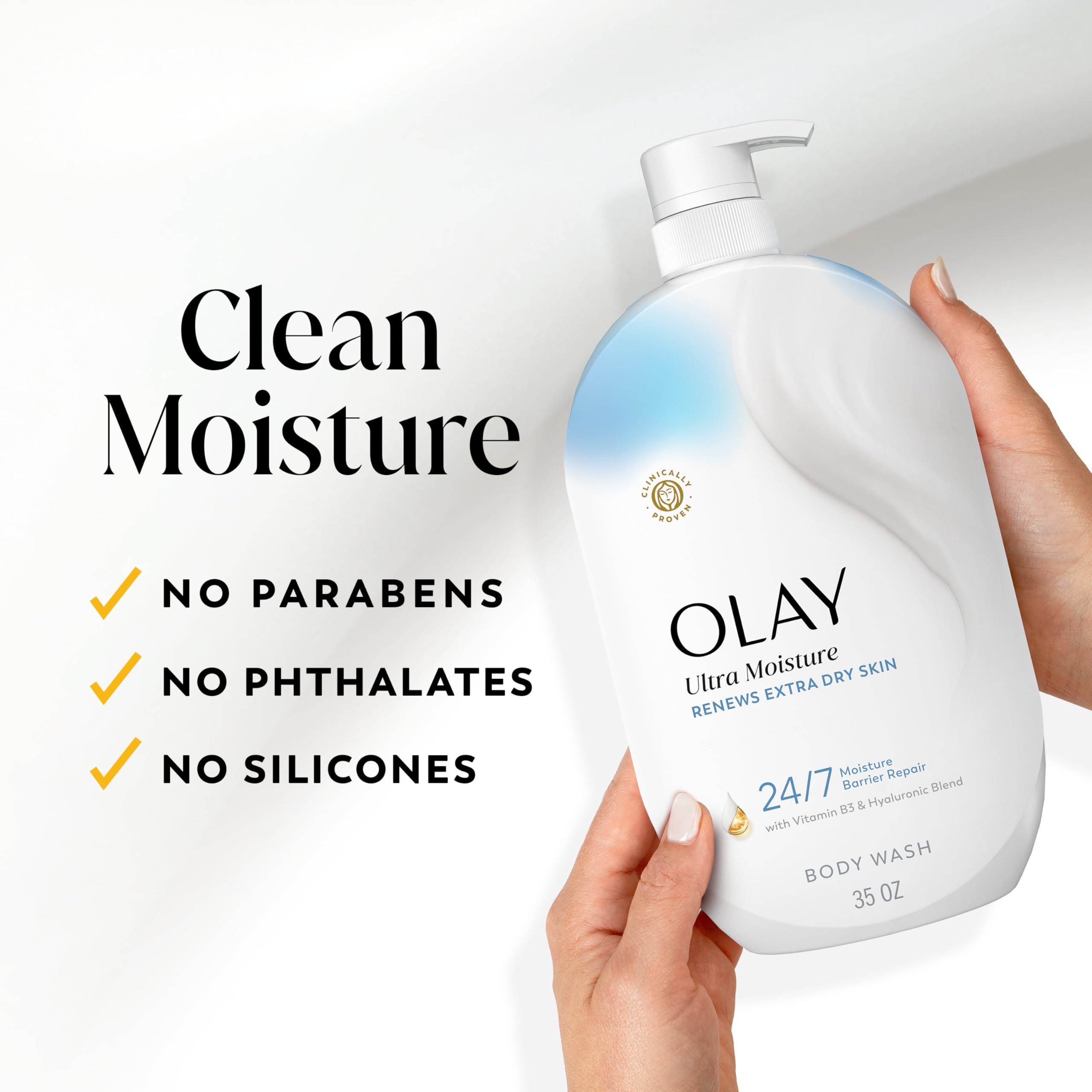 Olay hand applying lather on arm to show soft skin effect