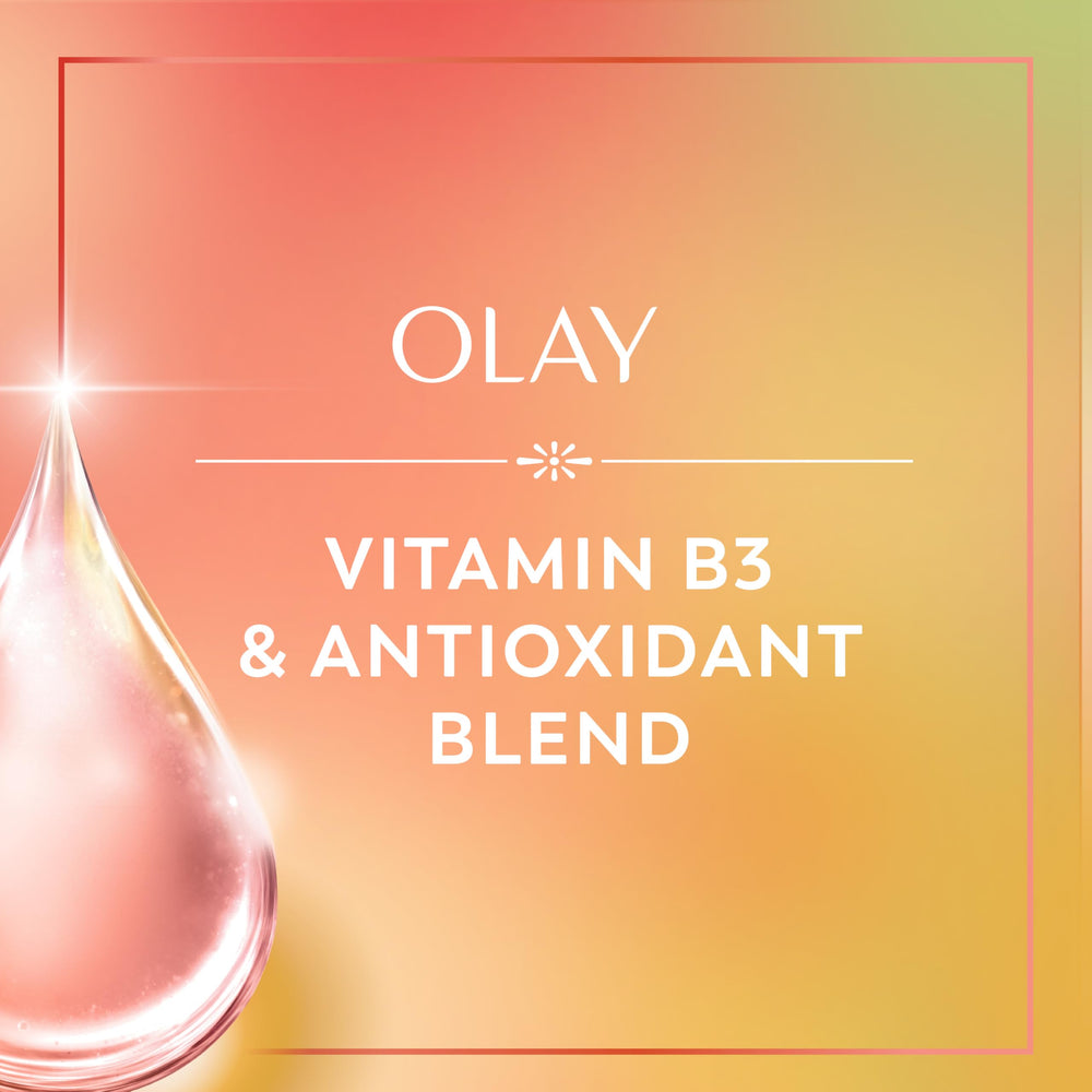 Olay bottle staged in bathroom suggesting tropical shower refreshment