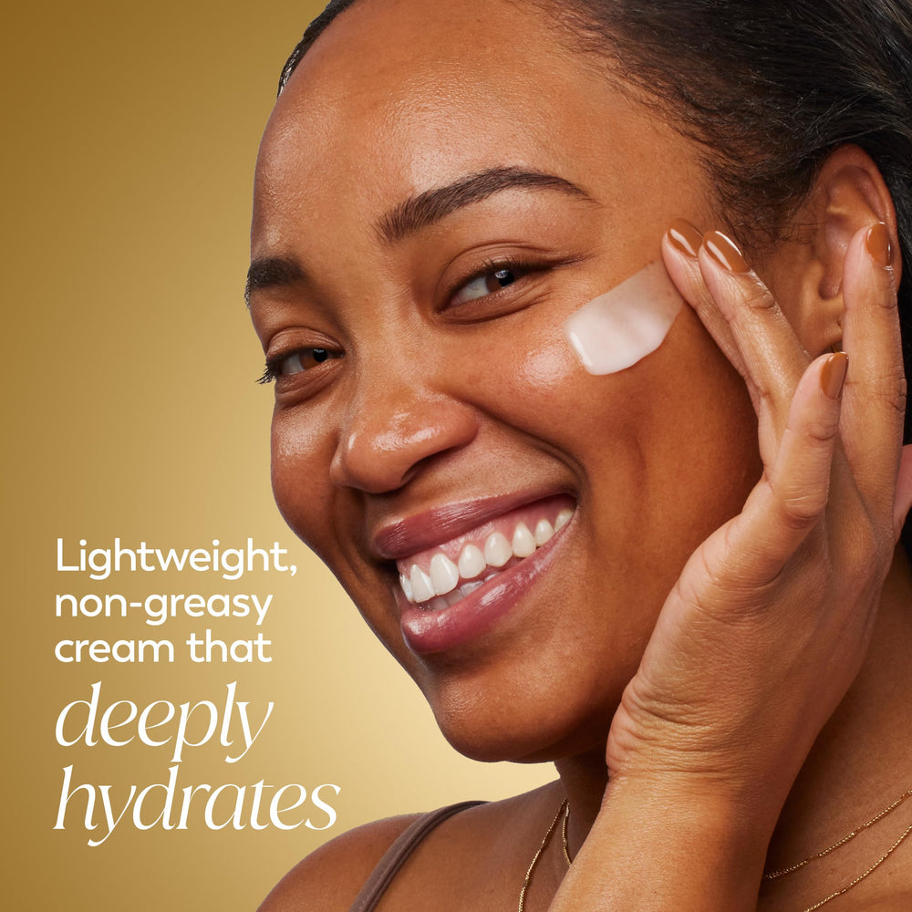 Olay open jar top view revealing creamy formula and easy scoopable texture