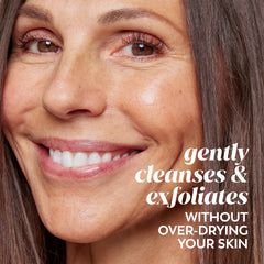Olay tube in hand showing 150 mL scale and travel friendliness