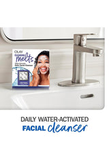 Olay pad close-up texture emphasizing creamy melt and gentle cleansing benefit