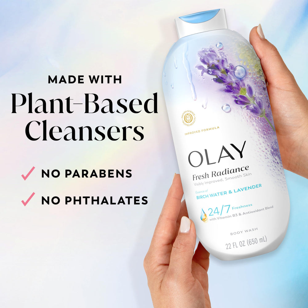 Olay bottle in hand for scale showing 22 fl oz size and value
