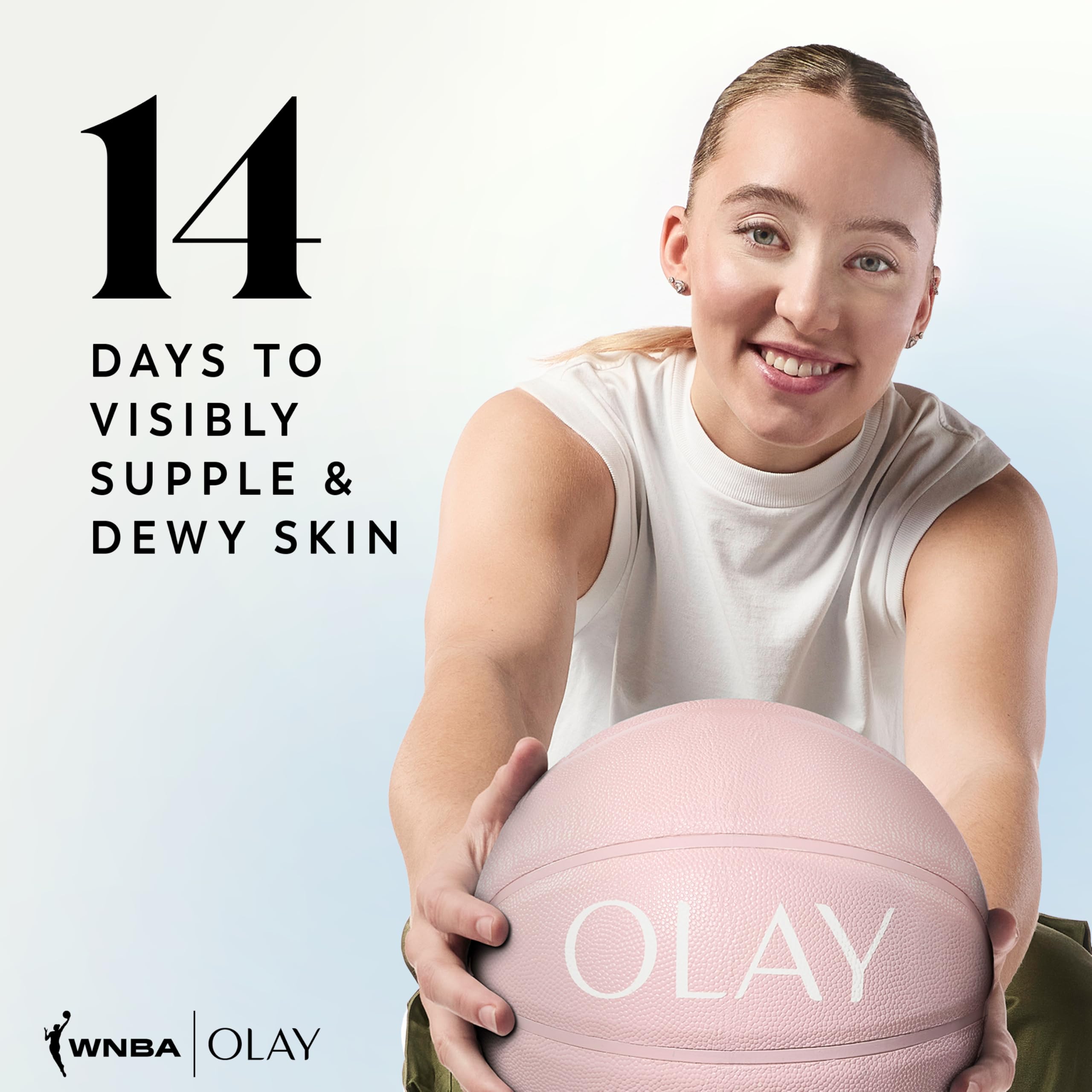 Olay bottle placed by folded towel illustrating bathroom-ready skincare convenience