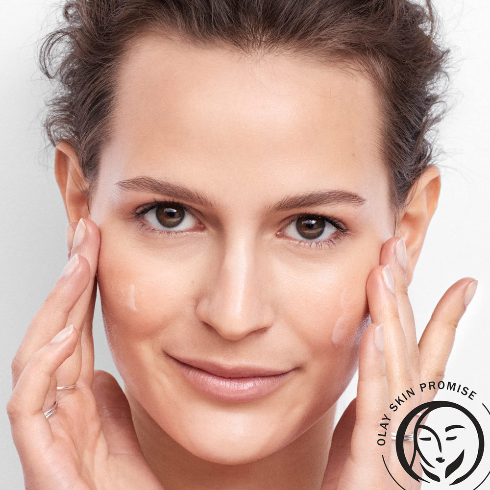 Olay serum staged on bathroom shelf suggesting routine-ready benefit