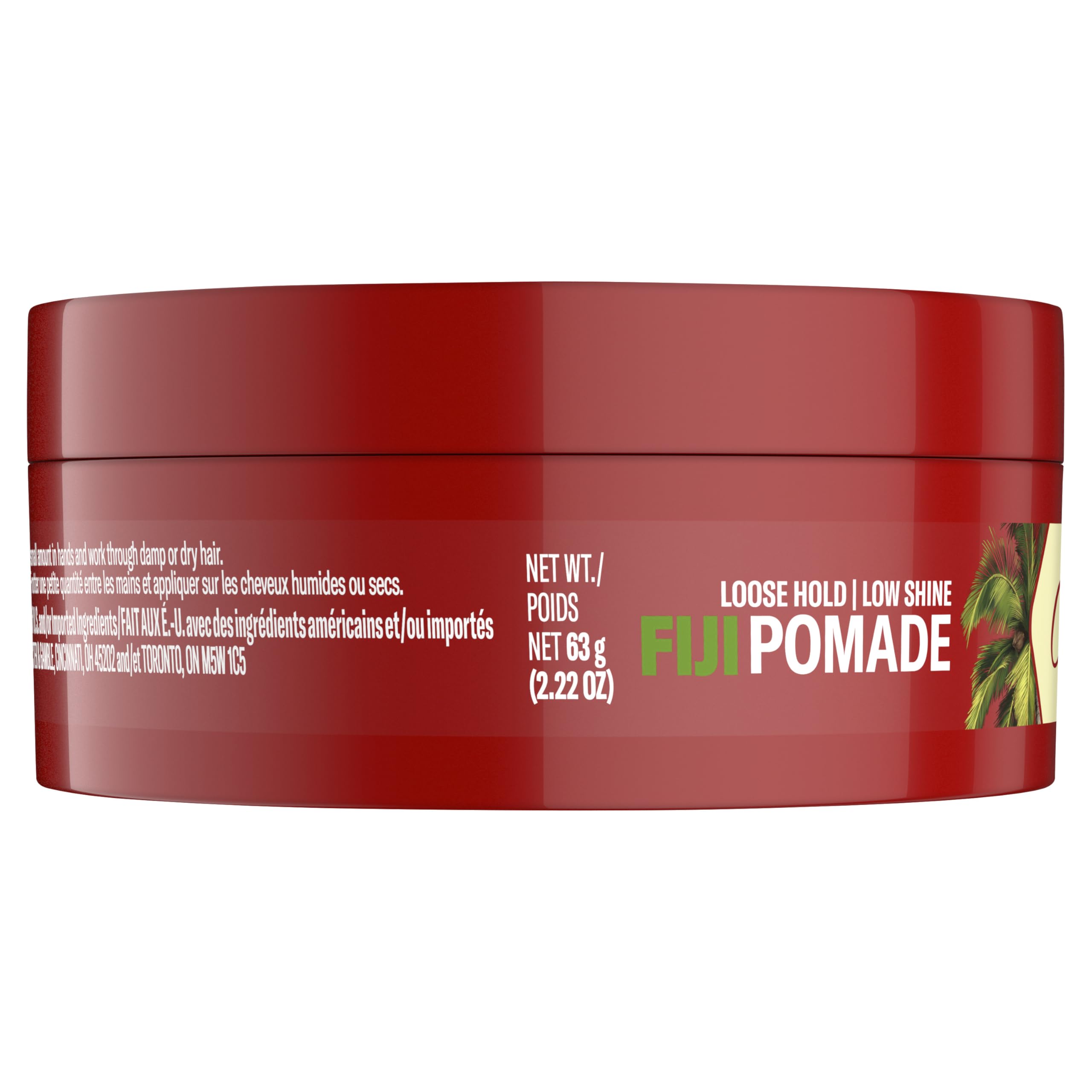 Lifestyle scene with Old Spice Fiji pomade and tropical props suggesting coconut-wood scent