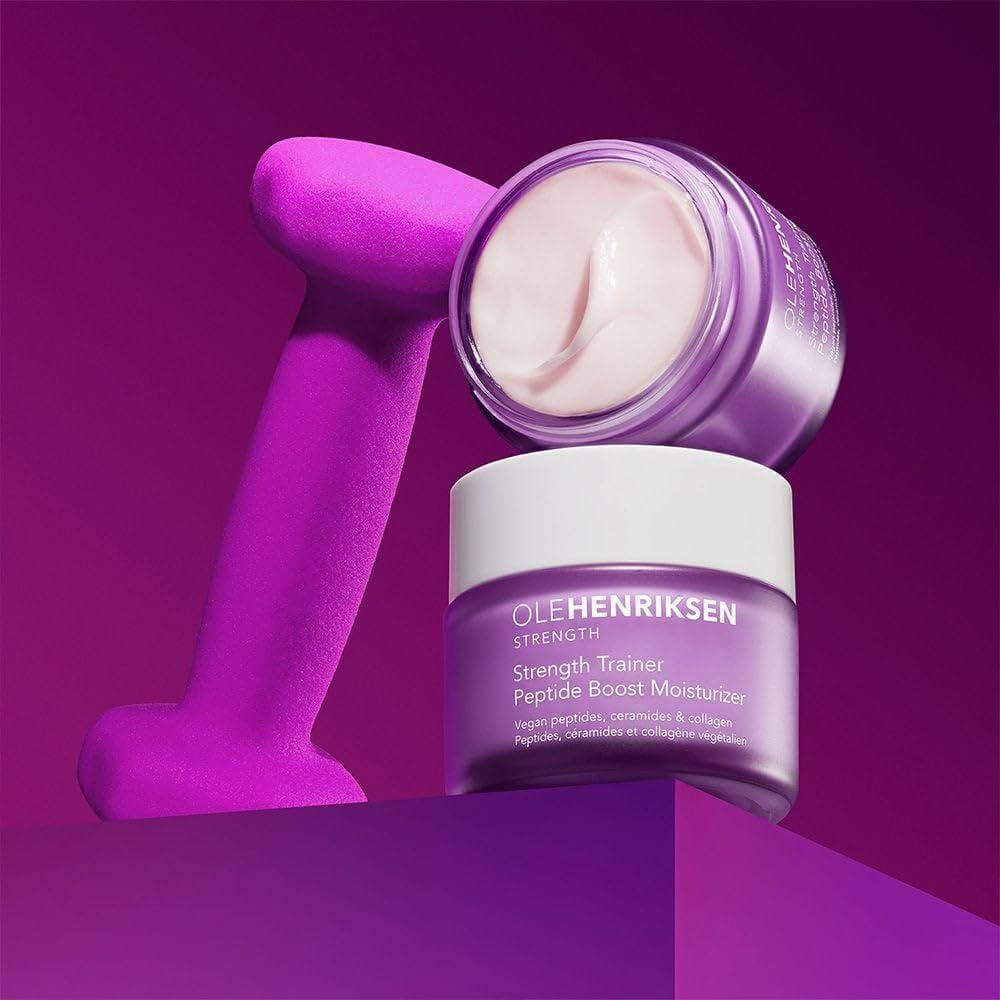 Ole Henriksen jar in hand illustrating 50ml size and travel-friendly convenience