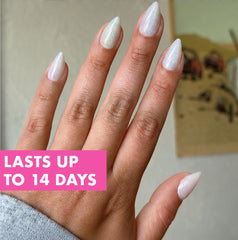 Olive & June applied on hand in a lifestyle scene showcasing polished, natural look