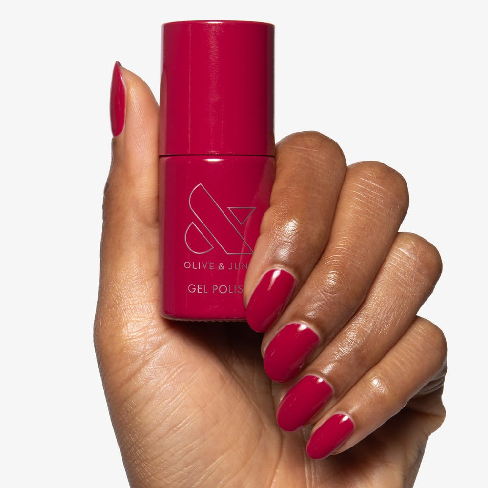 Olive & June gel polish curing under LED lamp showing fast, durable cure benefit