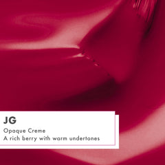 Olive & June swatch on a nail tip illustrating the rich Berry JG shade and glossy result
