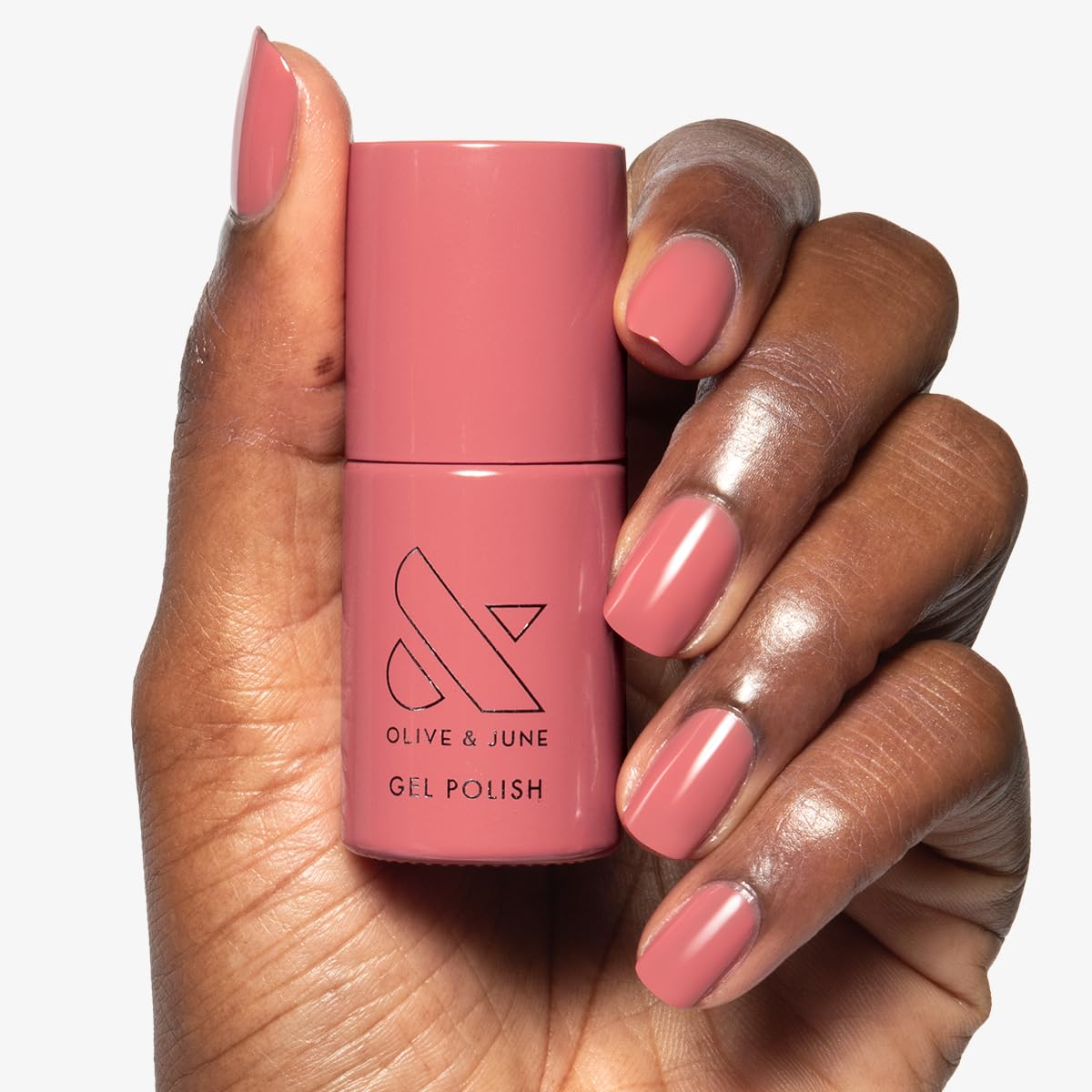 Olive & June gel polish application on fingernails delivering salon-quality color