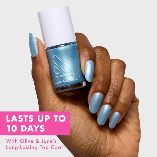 Olive & June wide fan brush spreading color for fast full-coverage application
