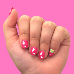 Olive & June close-up on Grogu nail art showing detailed print and playful finish