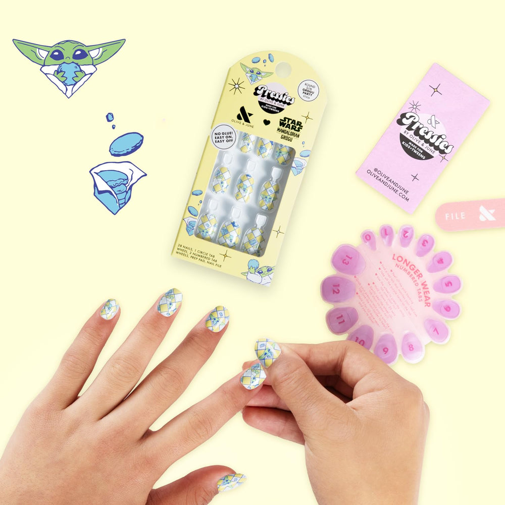 Olive & June nail tip being filed showing neat salon finish