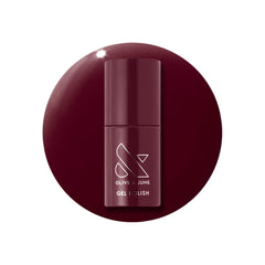 Olive & June bottle front view showing Obsessed Dark Ruby and glossy finish