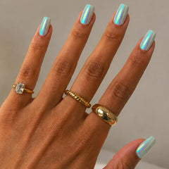 Olive & June front package showing teal glass chrome nails and instant mani benefits