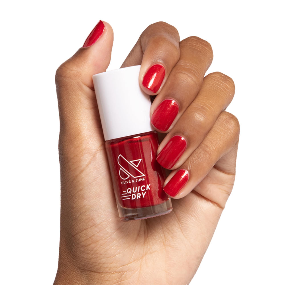 Olive & June front packaging showing shimmering red and quick-dry benefit