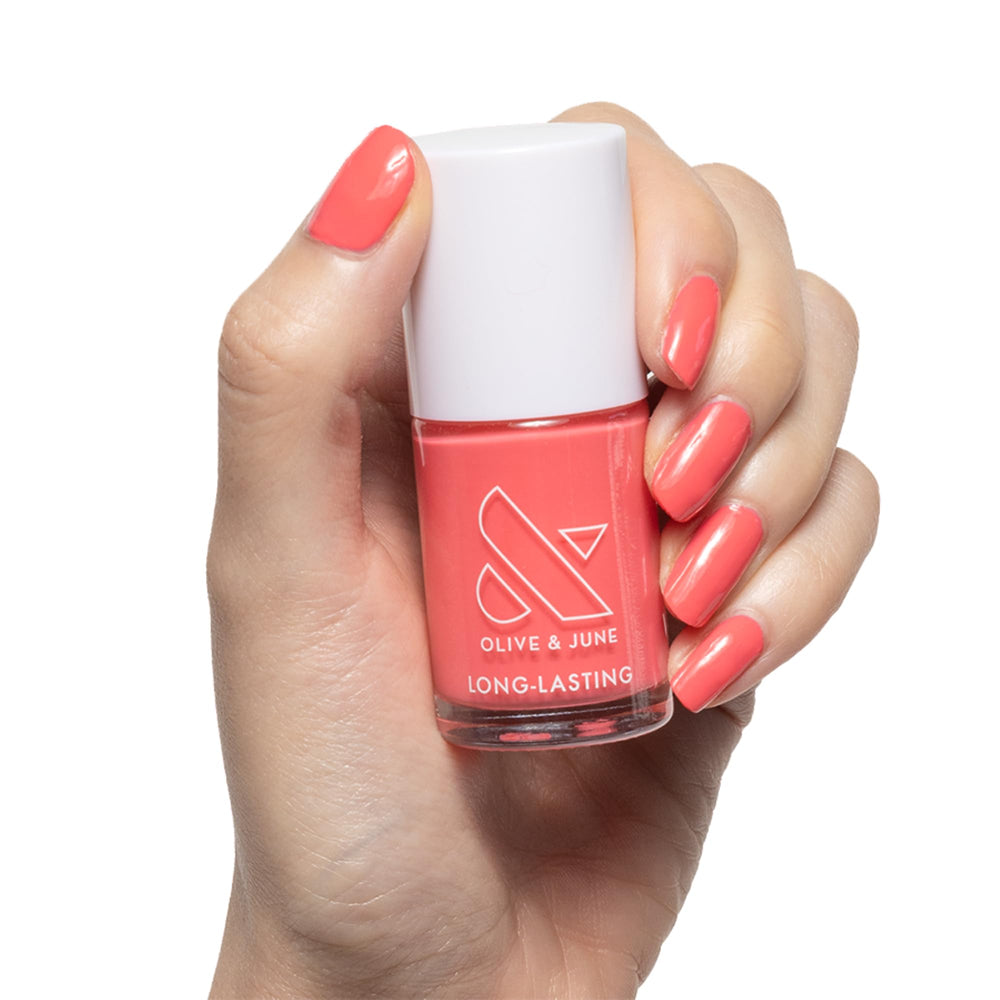 Olive & June front bottle shot showing vibrant Lobster Red and glossy finish