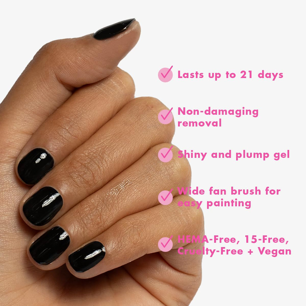 Olive & June LED lamp curing a manicure to show fast drying and lasting shine