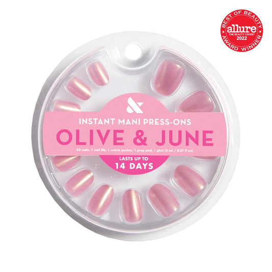 Olive & June 42-piece nail array laid out to display all 21 sizes and variety