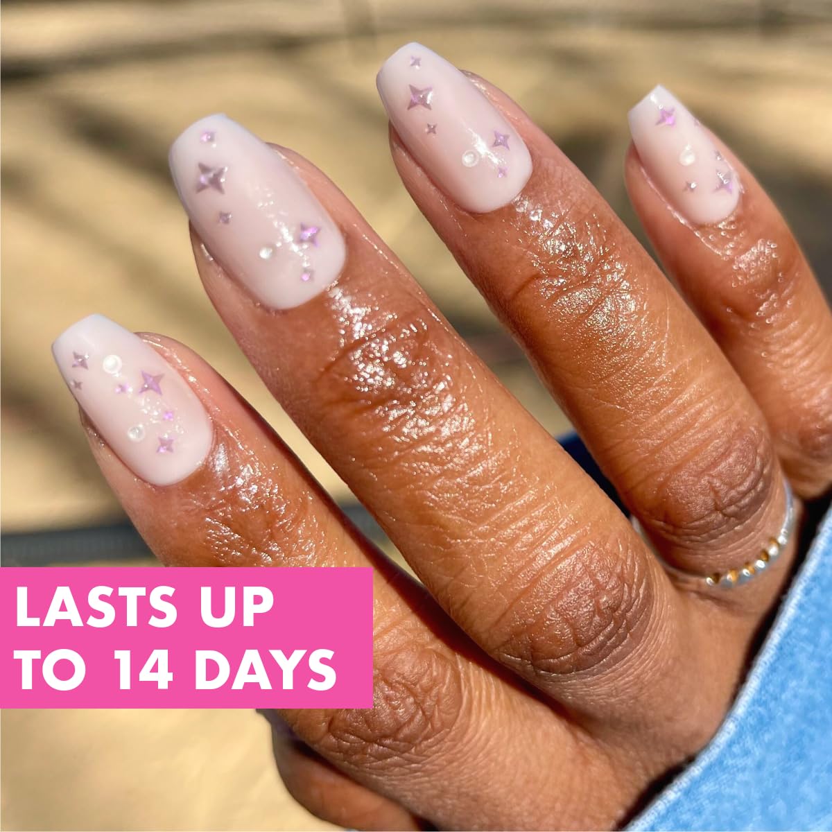 Olive & June nail curvature detail demonstrating realistic natural fit