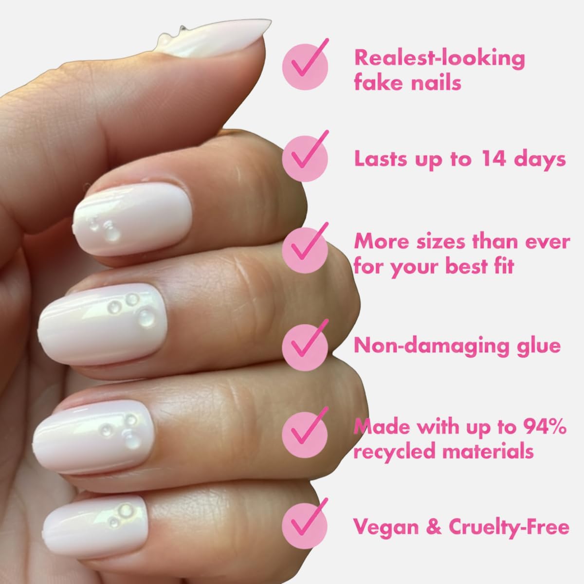 Olive & June nails applied on hands showing natural-looking short round benefit